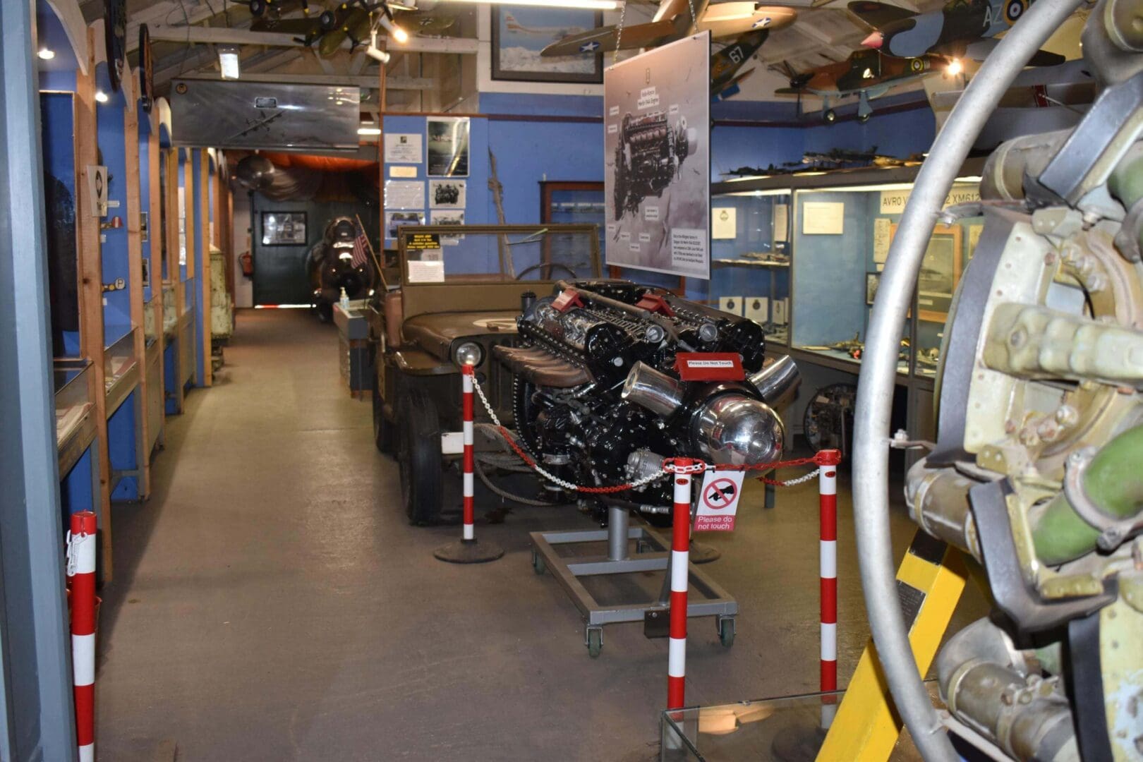 Museum exhibit featuring vintage aircraft engines.