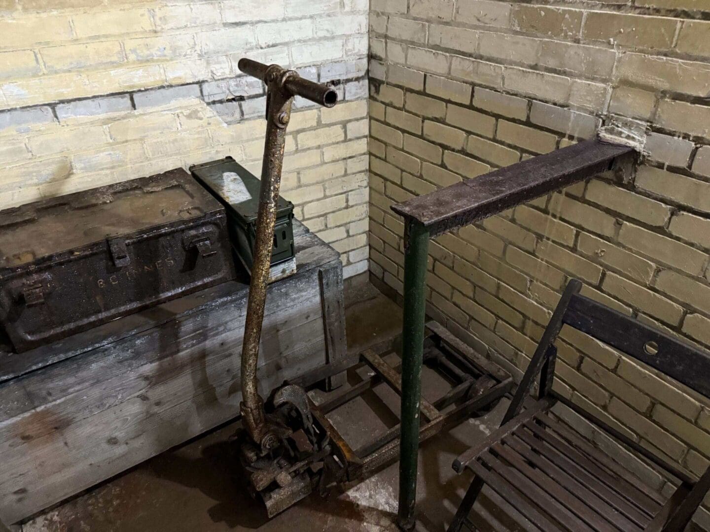 Old rusty tools and equipment in basement.
