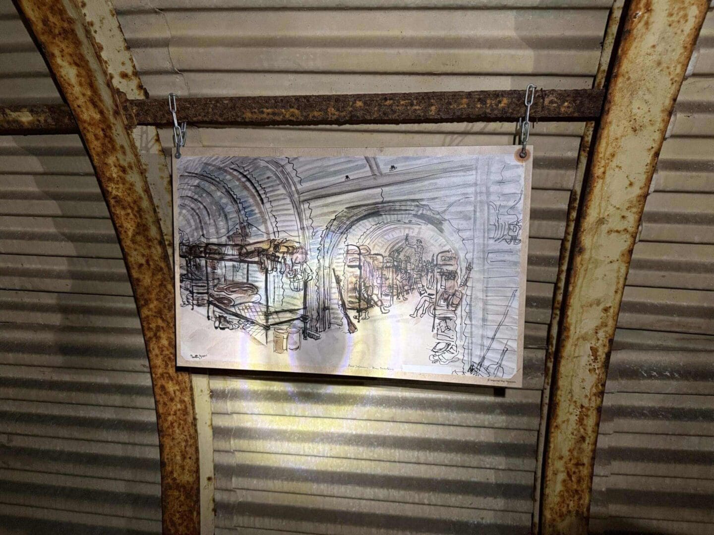 Drawing hanging in an underground shelter.