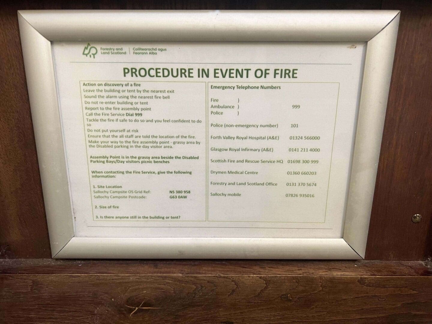 Fire emergency procedure notice in frame.